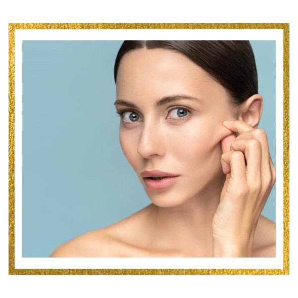 Woman stretching her face skin
